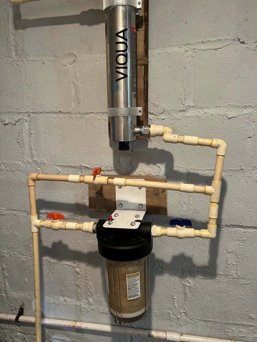 UV disinfection and filtration equipment installed on a well system